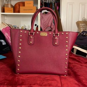 Michael Kors bag, wine color, only worn couple times. Great condition.
